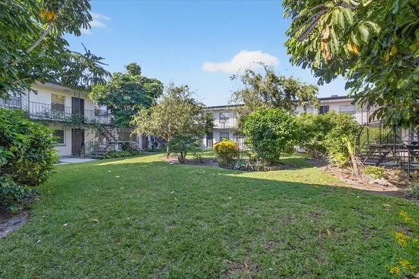 a view of a backyard with a garden