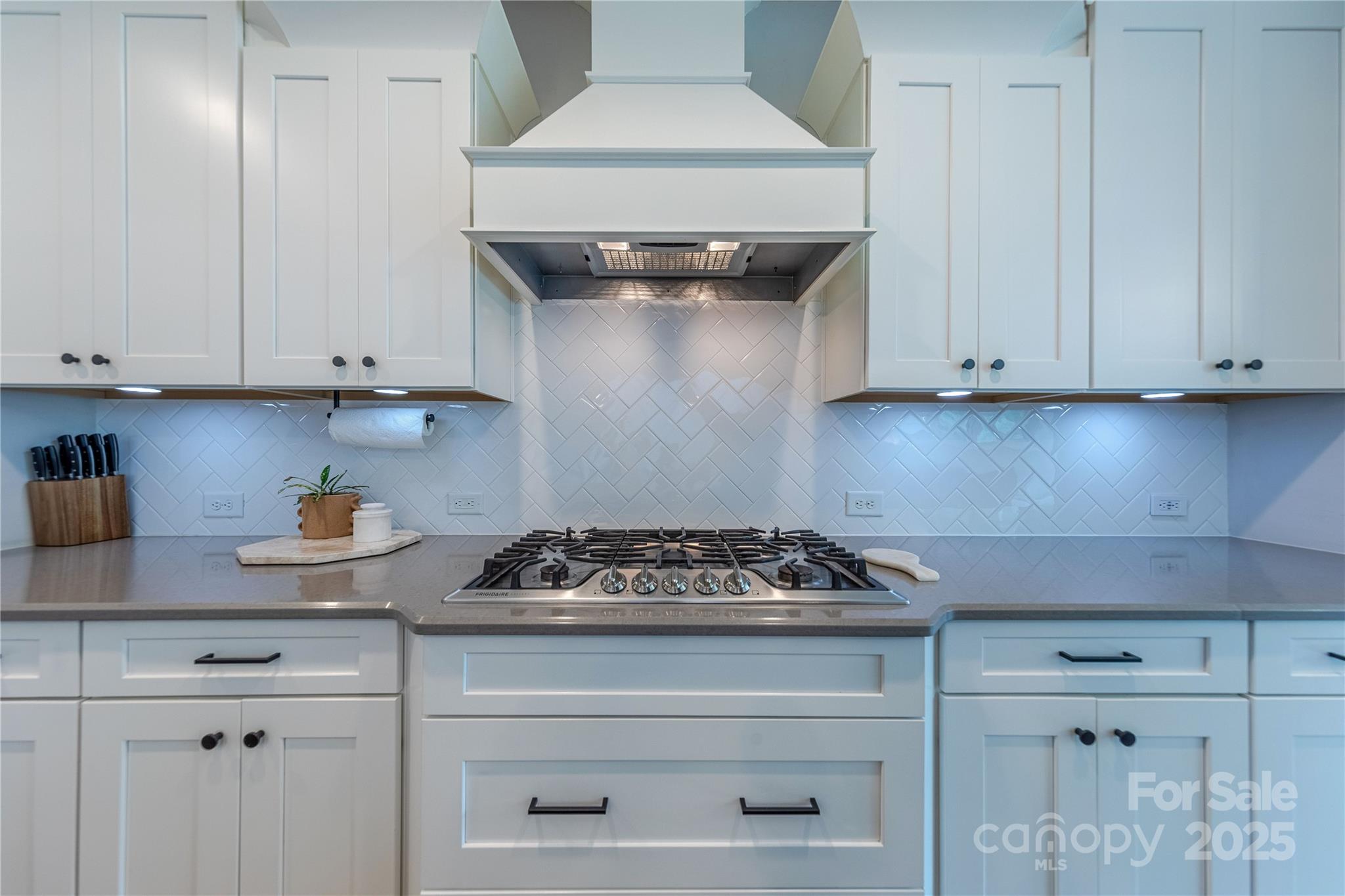 240 Hampton Trail Drive Fort Mill, SC 29708 - Photo 13 of 47 a kitchen with granite countertop white cabinets and a stove
