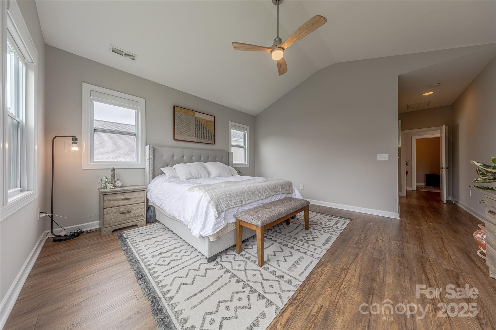 240 Hampton Trail Drive Fort Mill, SC 29708 - Photo 26 of 47 a spacious bedroom with a bed and a wooden floor