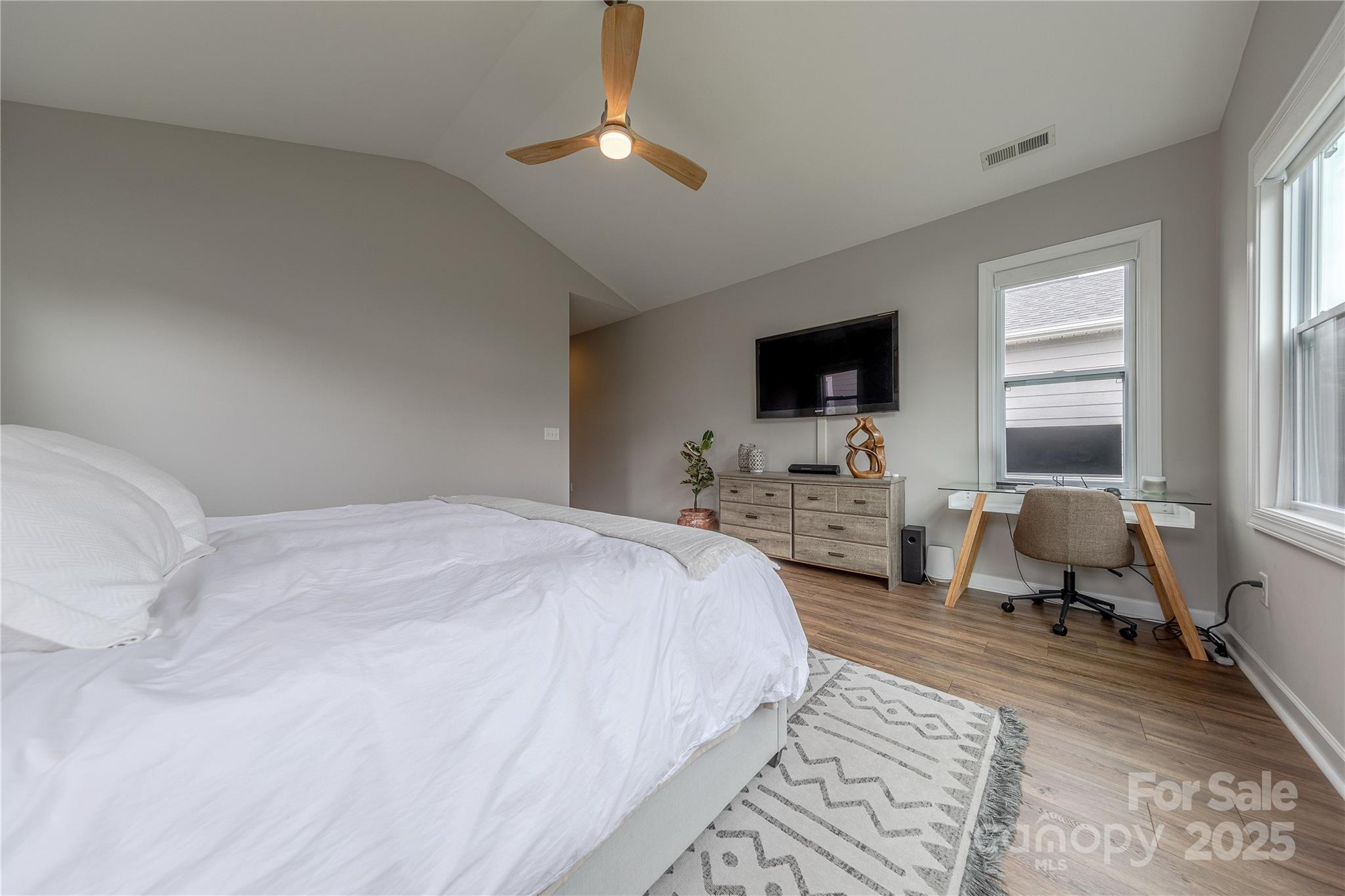 240 Hampton Trail Drive Fort Mill, SC 29708 - Photo 27 of 47 a spacious bedroom with a bed a couch and large window