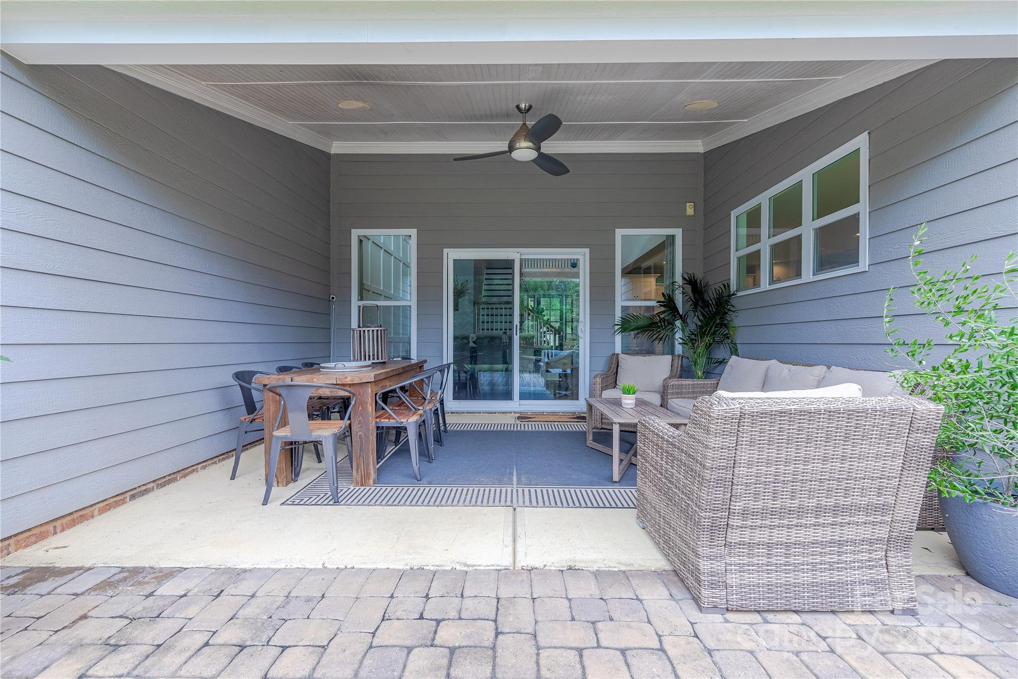 240 Hampton Trail Drive Fort Mill, SC 29708 - Photo 40 of 47 a view of a dinning table and chair in back of a house