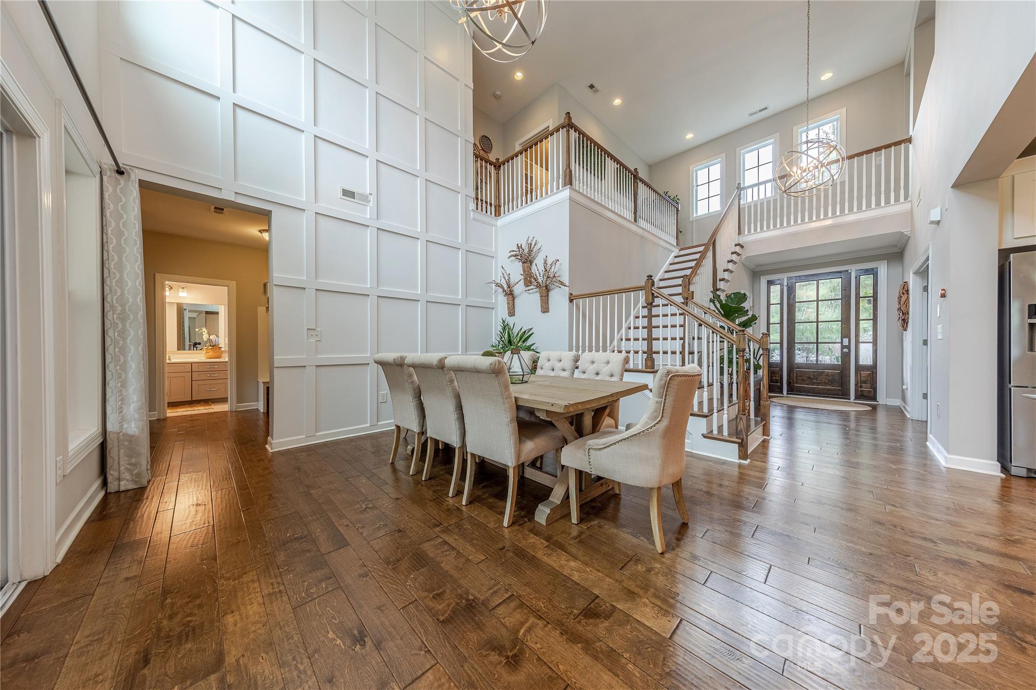 240 Hampton Trail Drive Fort Mill, SC 29708 - Photo 8 of 47 a view of a dining room with furniture and wooden floor