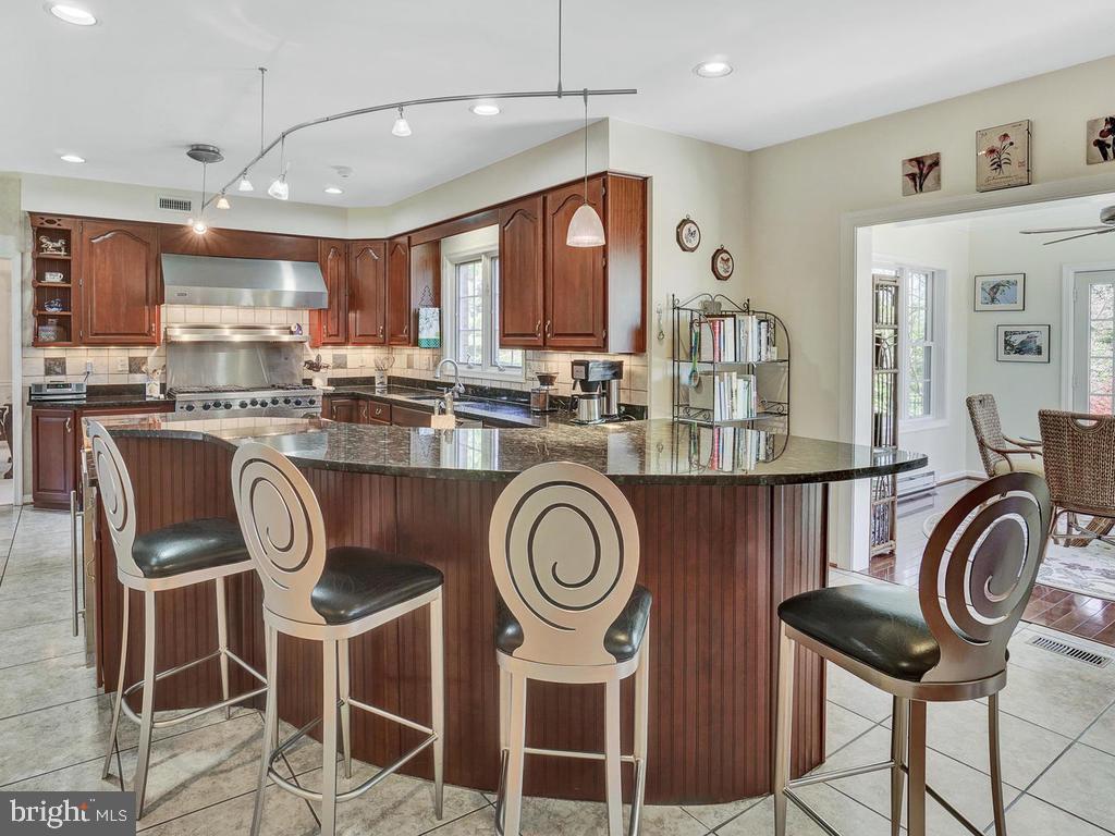 5007 South Renn Court Frederick, MD 21703 - Photo 23 of 67 Dual level island, perfect for breakfast!