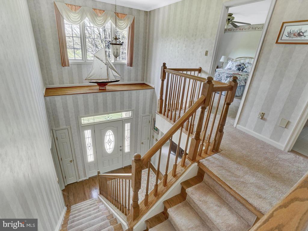 5007 South Renn Court Frederick, MD 21703 - Photo 33 of 67 Open staircase to second floor living!