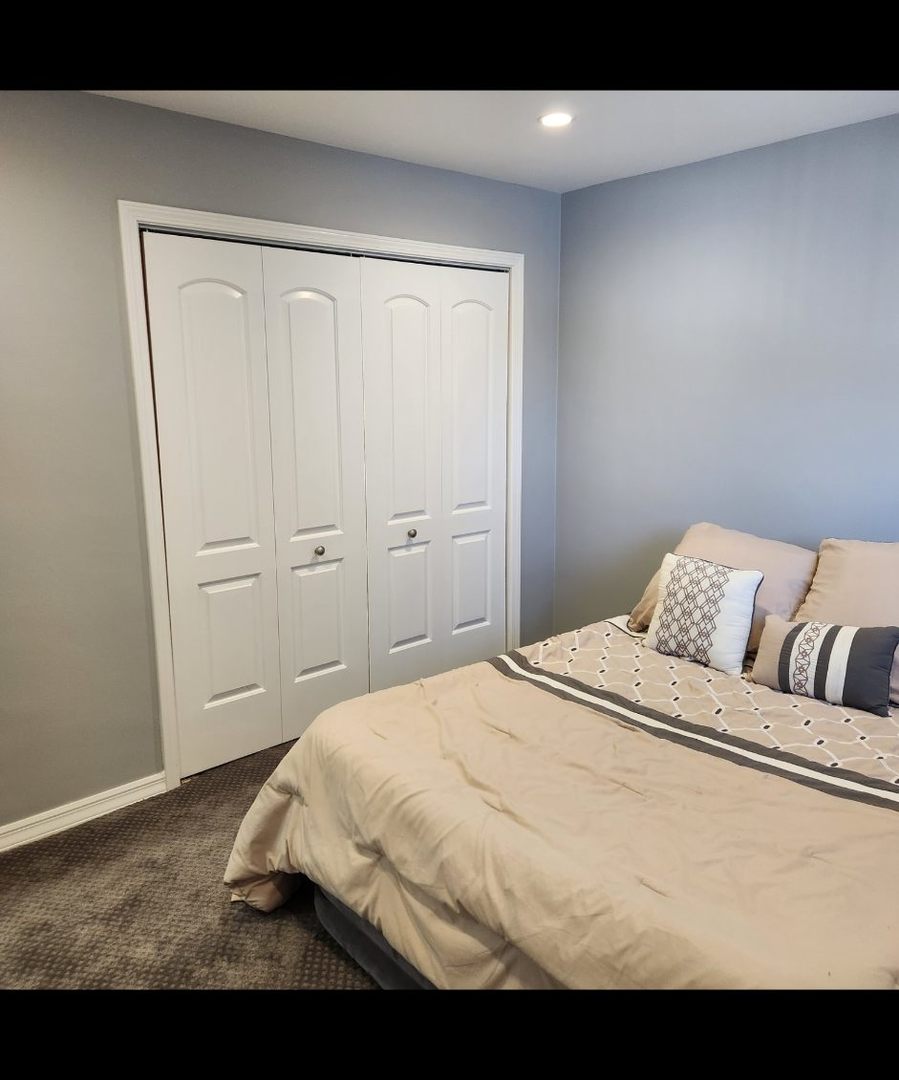 720 North Western Avenue, Unit 10 Park Ridge, IL 60068 - Photo 12 of 19 a bedroom with a bed and with view
