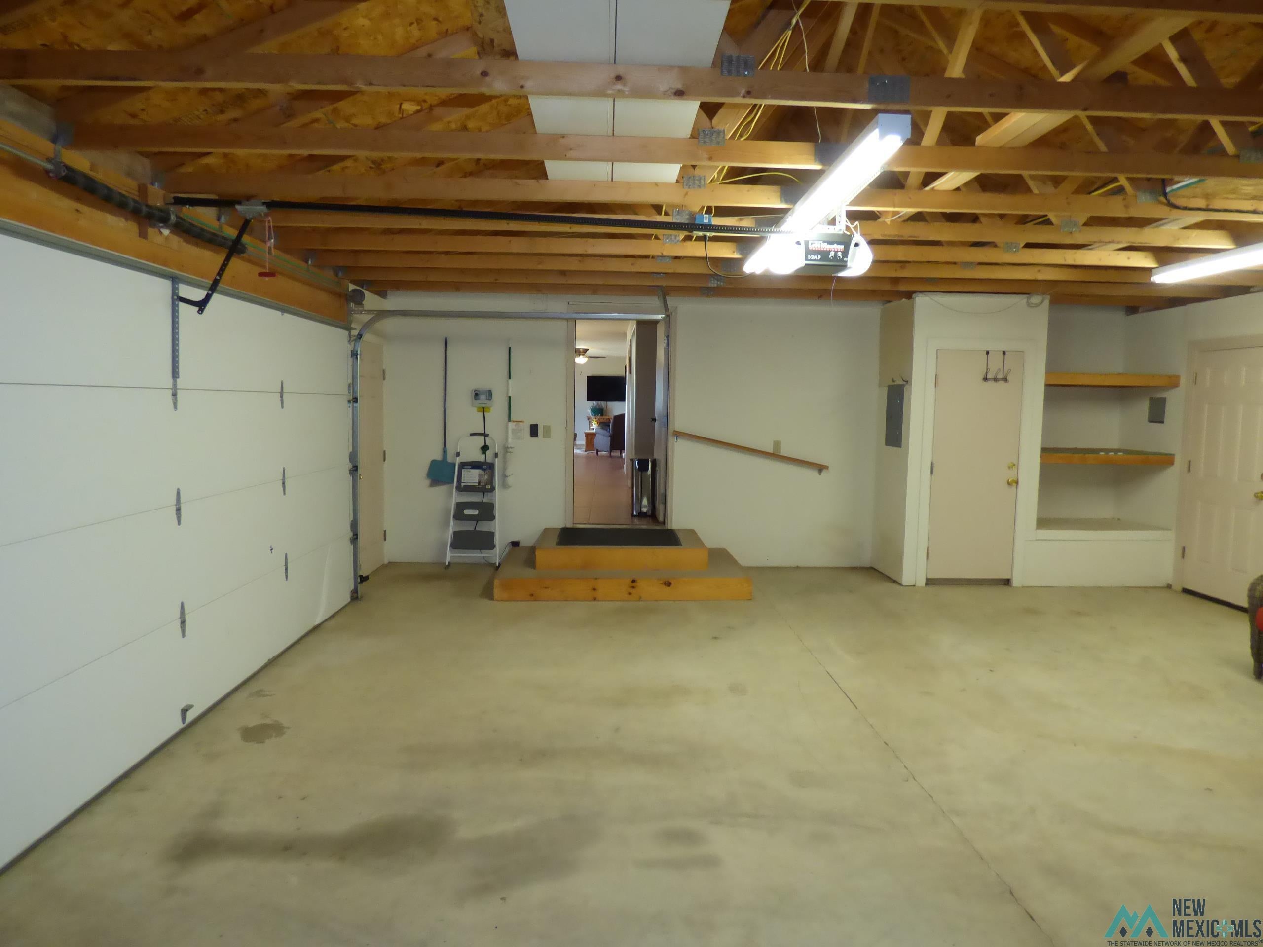 15 South Pond Lane Raton, NM 87740 - Photo 24 of 40 Oversized 2 car garage with shop space.