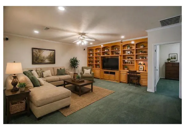 a living room with furniture and a window