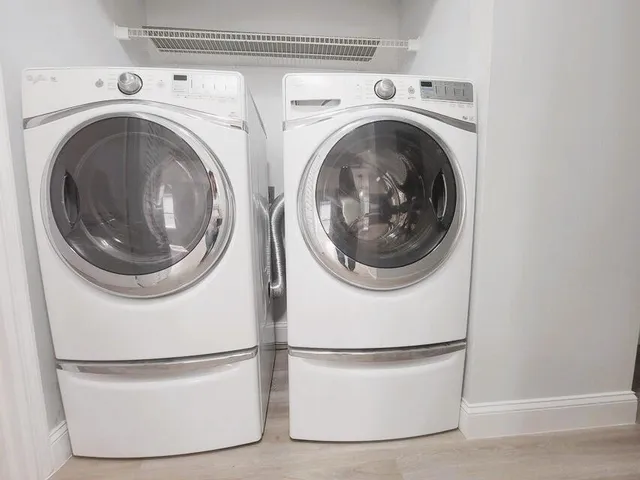 a utility room with dryer and washer
