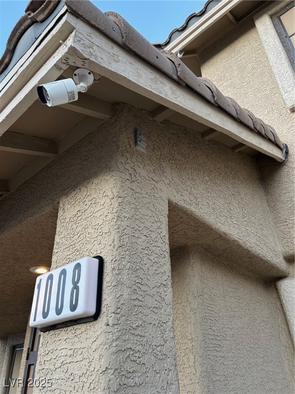1008 Ridgegate Street Henderson, NV 89002 - Photo 46 of 46 Exterior view of a surveillance system and outlet for Christmas Lights