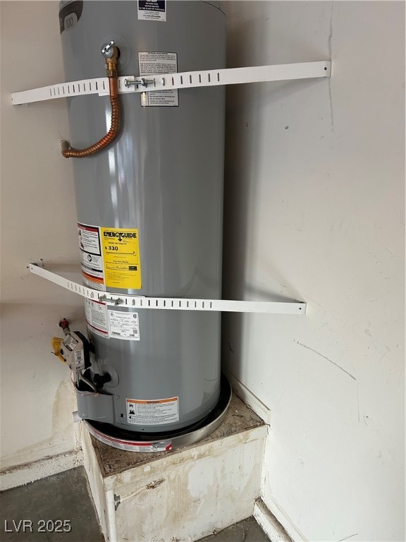 Garage featuring water heater