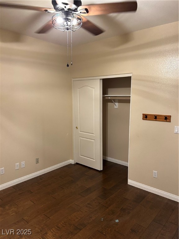 1008 Ridgegate Street Henderson, NV 89002 - Photo 10 of 46 Unfurnished bedroom with dark wood-type flooring, a closet, and ceiling fan