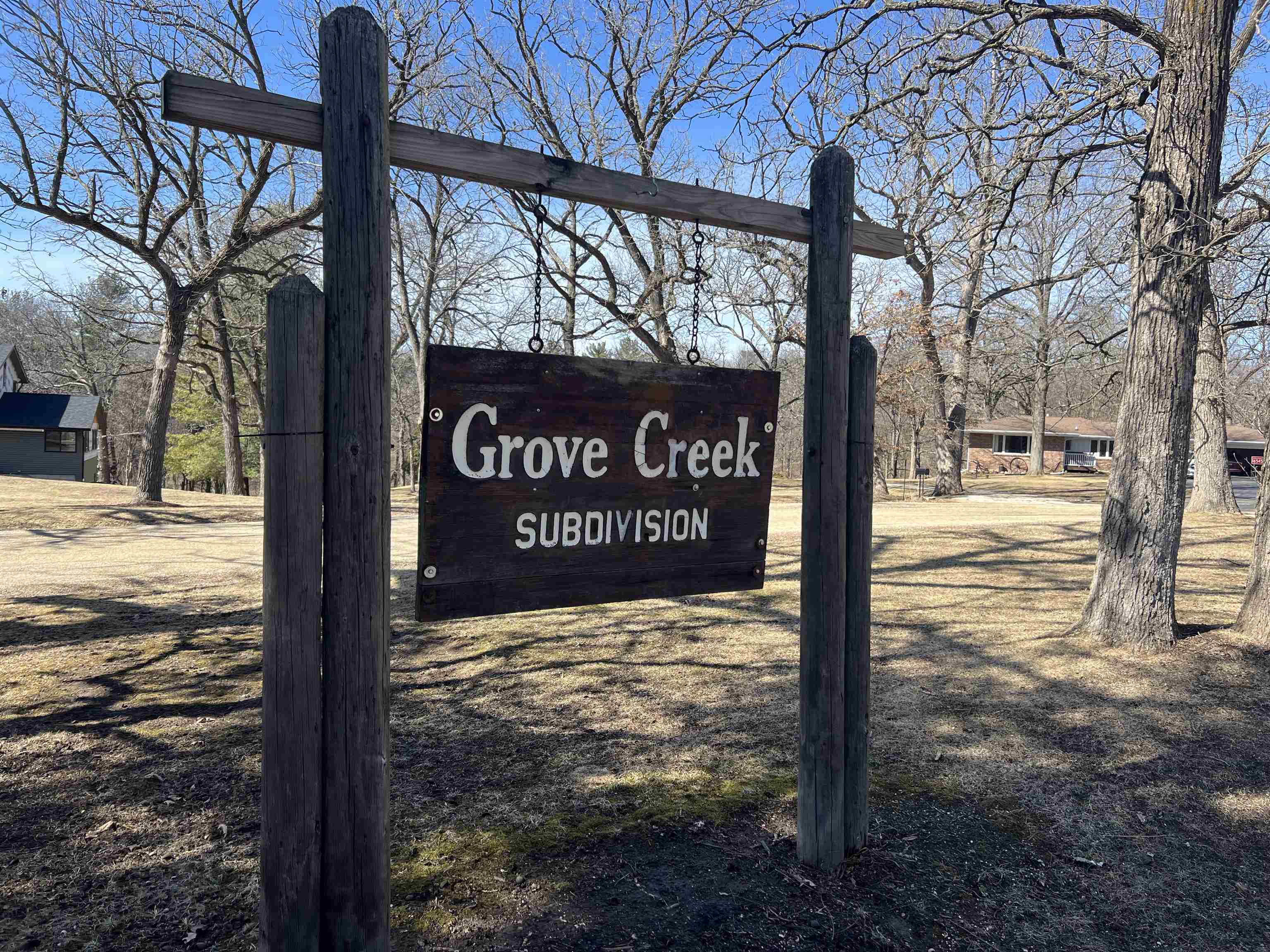 16524 Grove Creek Circle Pecatonica, IL 61063 - Photo 5 of 8 a sign board on the side of the road