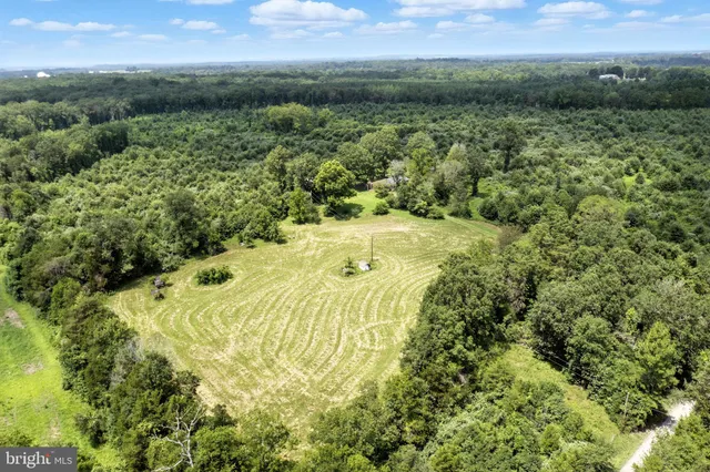 a view of a big yard with green space