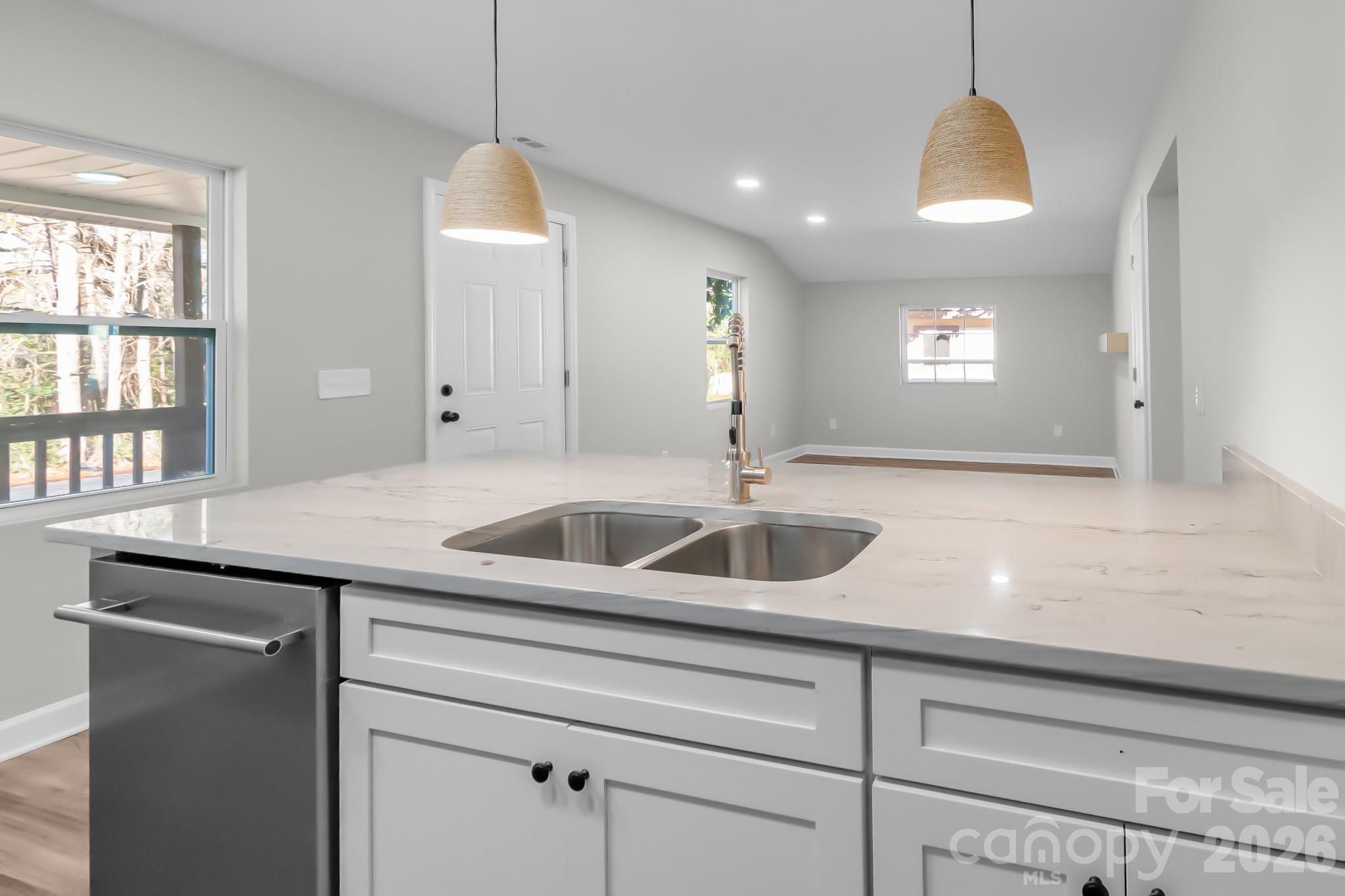 401 Golf Course Road Winnsboro, SC 29180 - Photo 14 of 39 a kitchen with a sink and a window