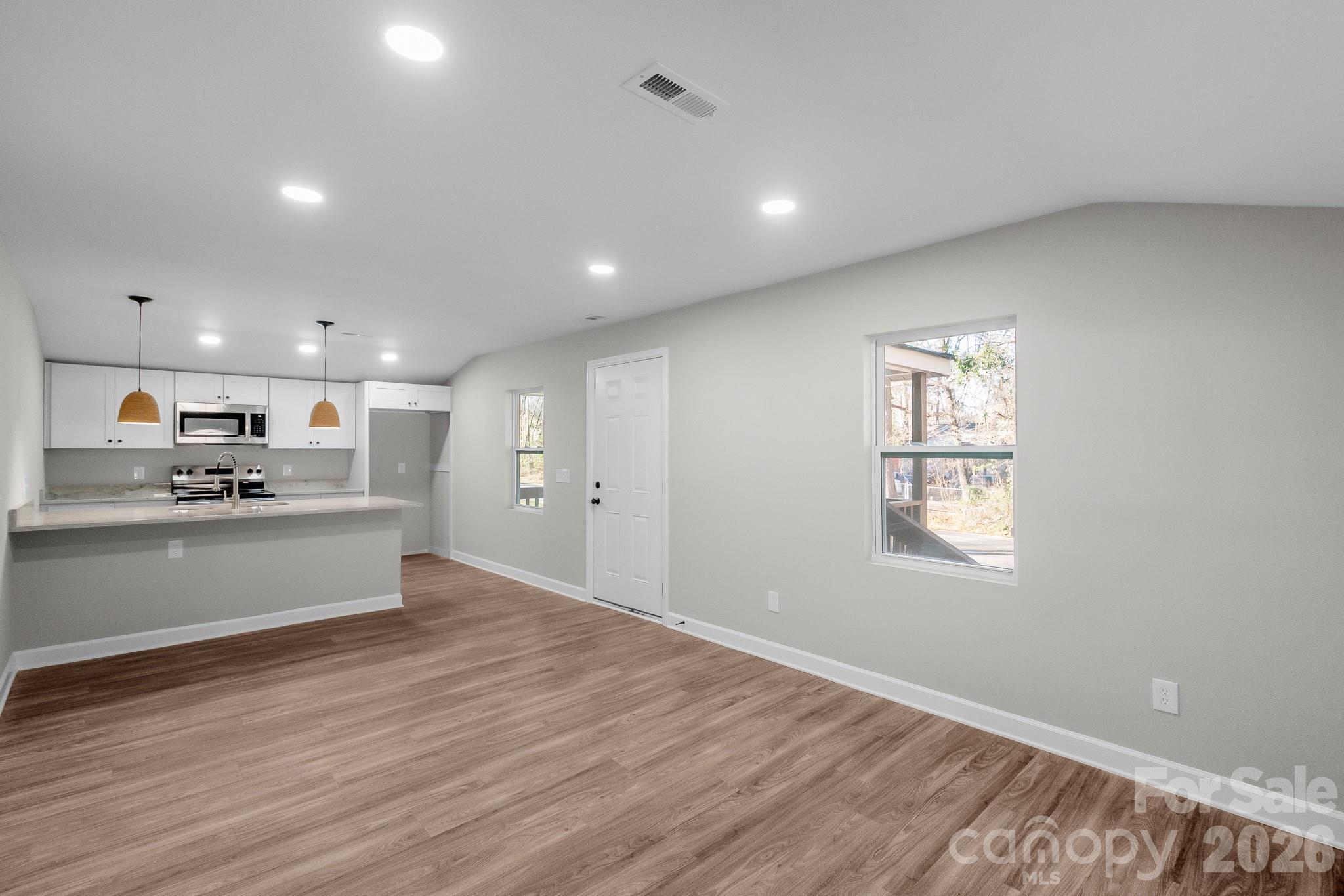 401 Golf Course Road Winnsboro, SC 29180 - Photo 25 of 39 a view of kitchen with wooden floor