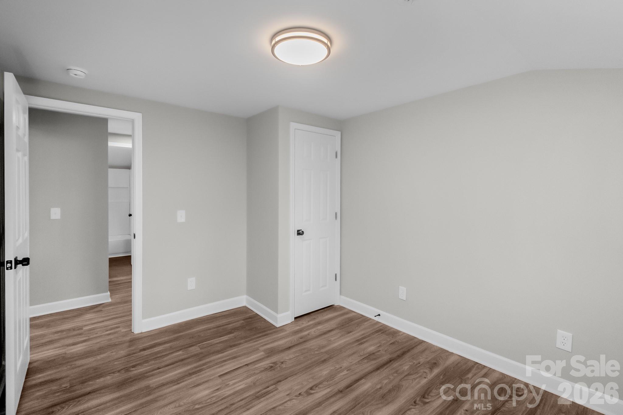401 Golf Course Road Winnsboro, SC 29180 - Photo 27 of 39 a view of a room with wooden floor and a window