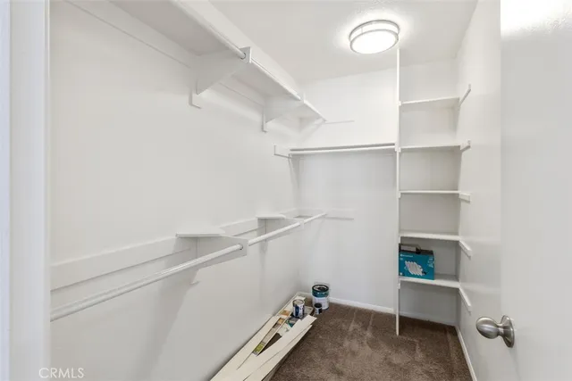 a view of an empty walk in closet