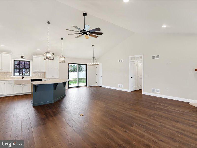 13 Rolling Meadow Road Lebanon, PA 17046 - Photo 13 of 31 a view of a room with wooden floor and ceiling fan