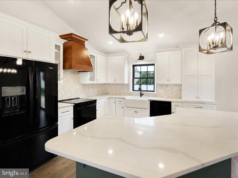 13 Rolling Meadow Road Lebanon, PA 17046 - Photo 16 of 31 a kitchen with stainless steel appliances kitchen island granite countertop a sink a stove and cabinets