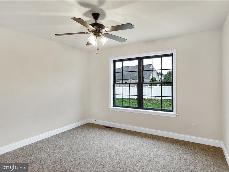 13 Rolling Meadow Road Lebanon, PA 17046 - Photo 24 of 31 an empty room with a window and a fan