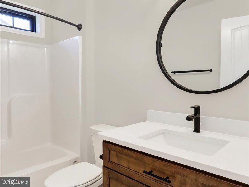 13 Rolling Meadow Road Lebanon, PA 17046 - Photo 27 of 31 a bathroom with a sink a toilet and shower