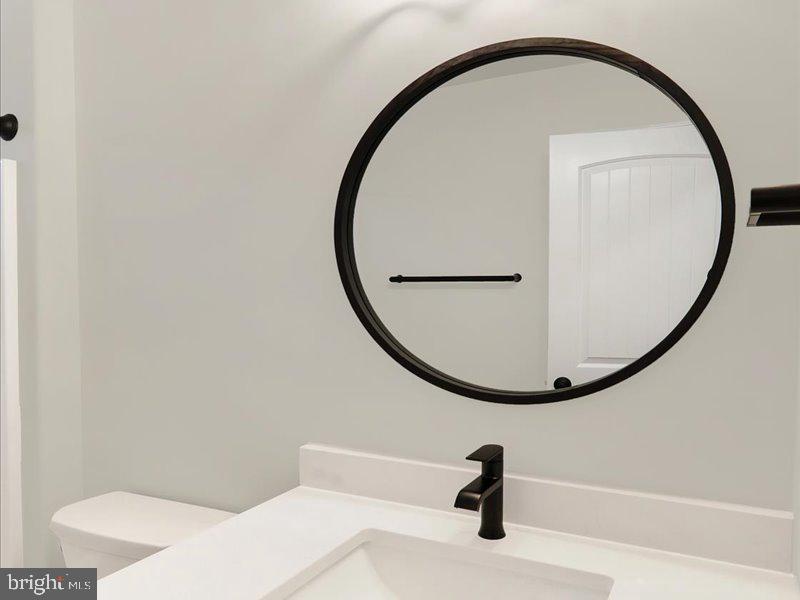 13 Rolling Meadow Road Lebanon, PA 17046 - Photo 28 of 31 a bathroom with a sink and a mirror