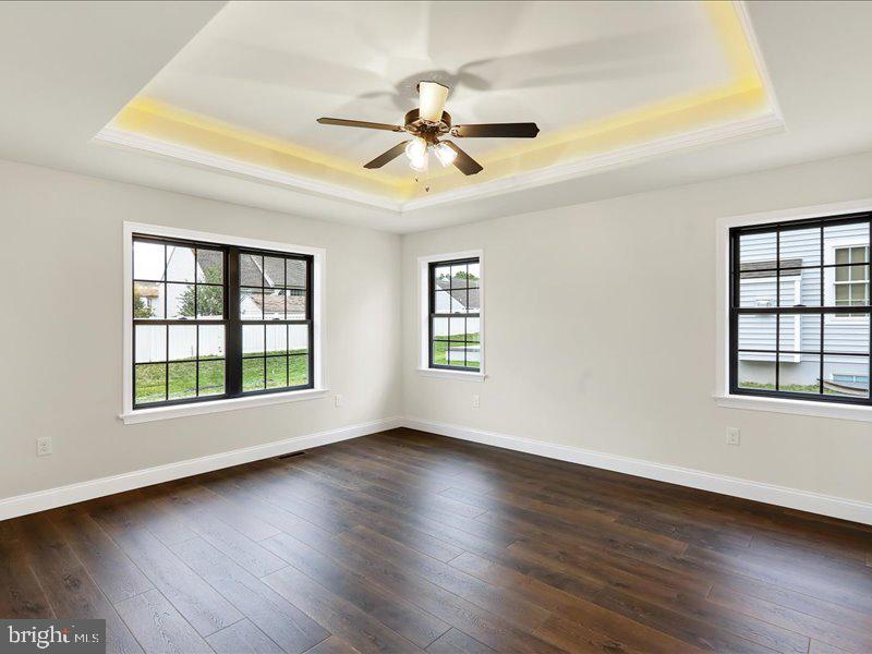 13 Rolling Meadow Road Lebanon, PA 17046 - Photo 4 of 31 a view of an empty room with wooden floor and a window