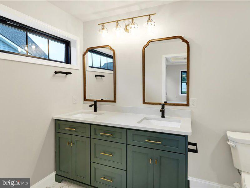 13 Rolling Meadow Road Lebanon, PA 17046 - Photo 7 of 31 a bathroom with double vanity sinks and a mirror