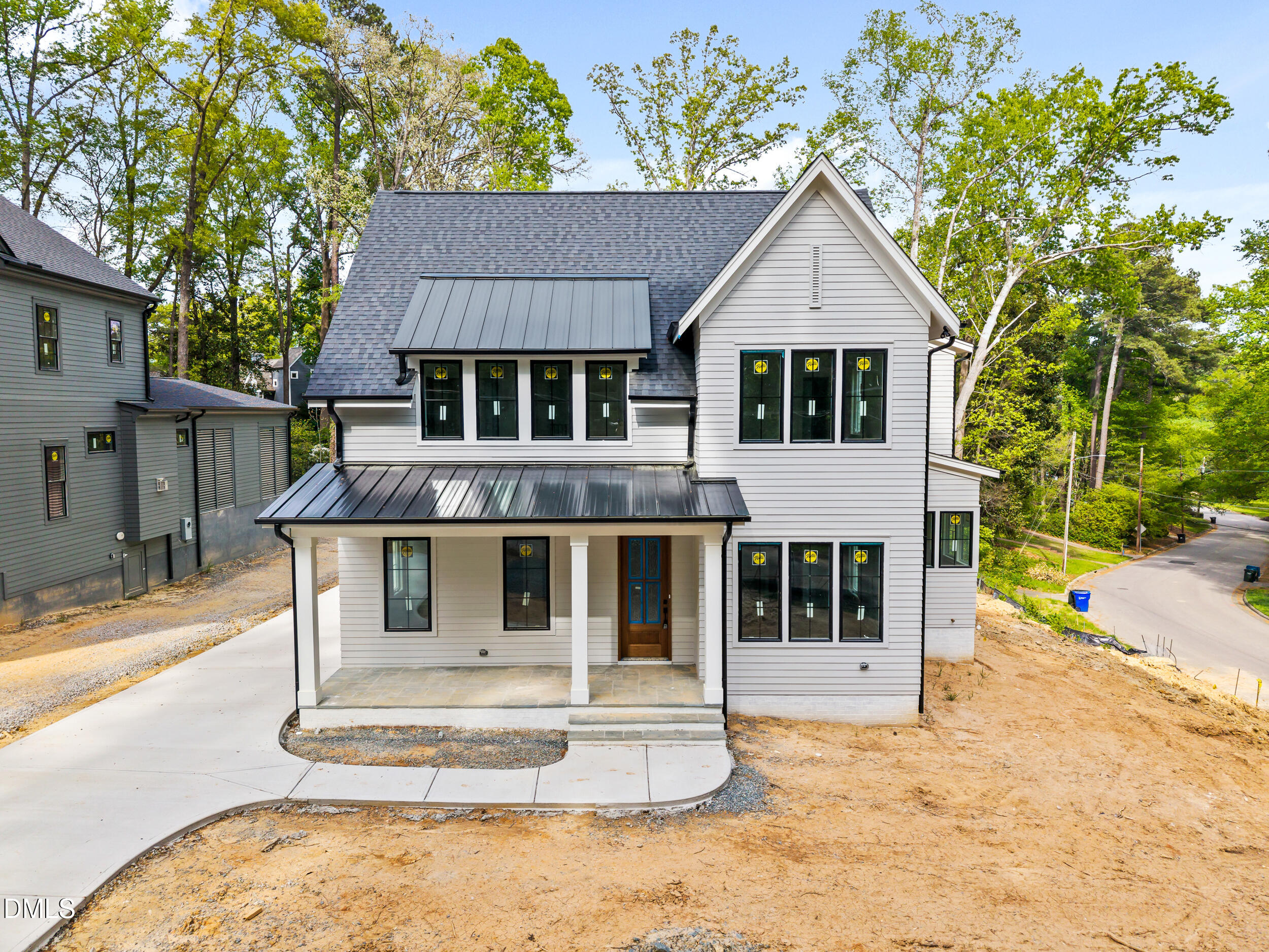 4 Chantilly Place Durham, NC 27707 - Photo 42 of 49 a front view of a house with a porch