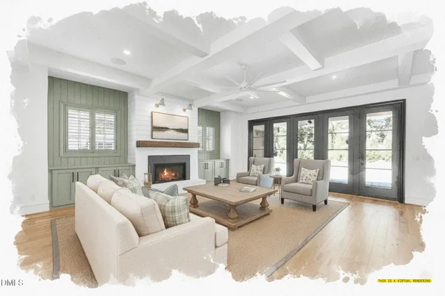 a living room with furniture large window and a fireplace