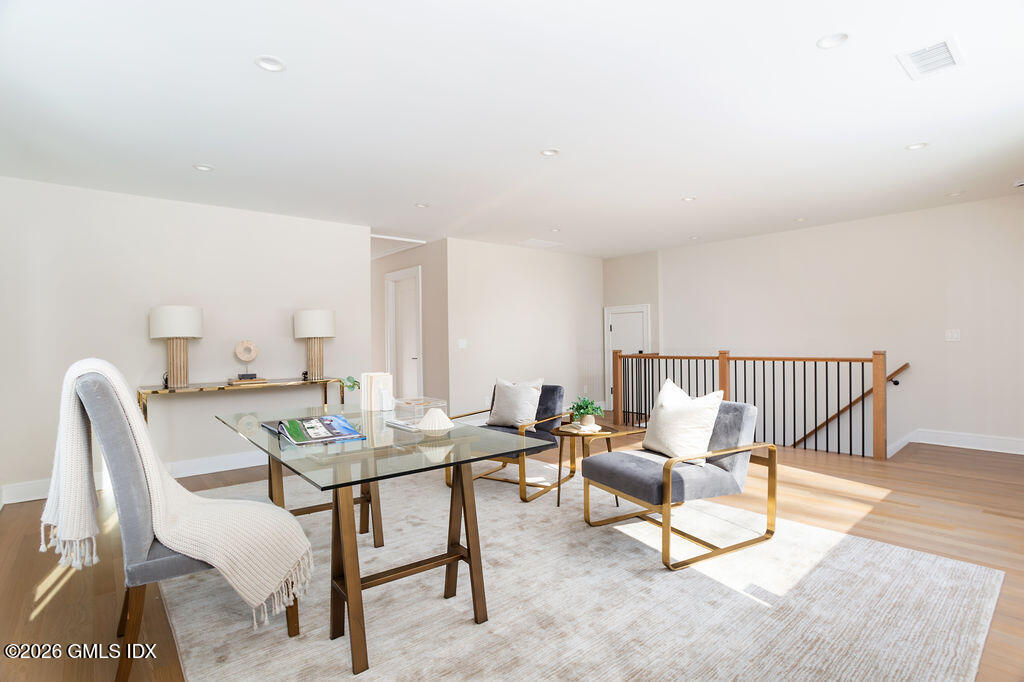 49 Salisbury Road Darien, CT 06820 - Photo 30 of 40 a living room with furniture and a rug