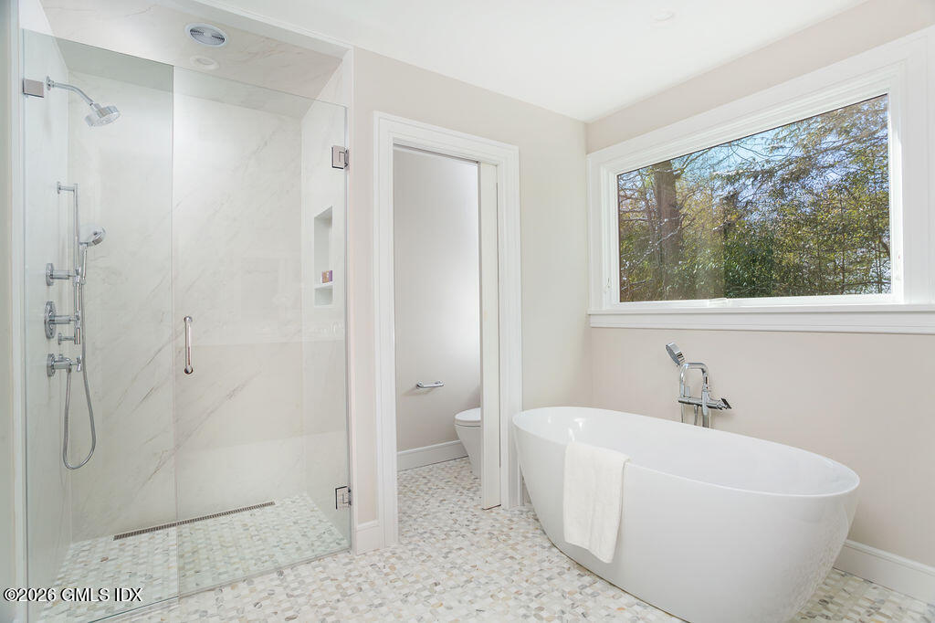 49 Salisbury Road Darien, CT 06820 - Photo 32 of 40 a white bath tub sitting next to a white toilet