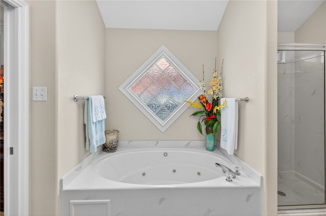 15969 Punta Espada Loop Corpus Christi, TX 78418 - Photo 18 of 40 Primary bath - large jet soaking tub with walk-in