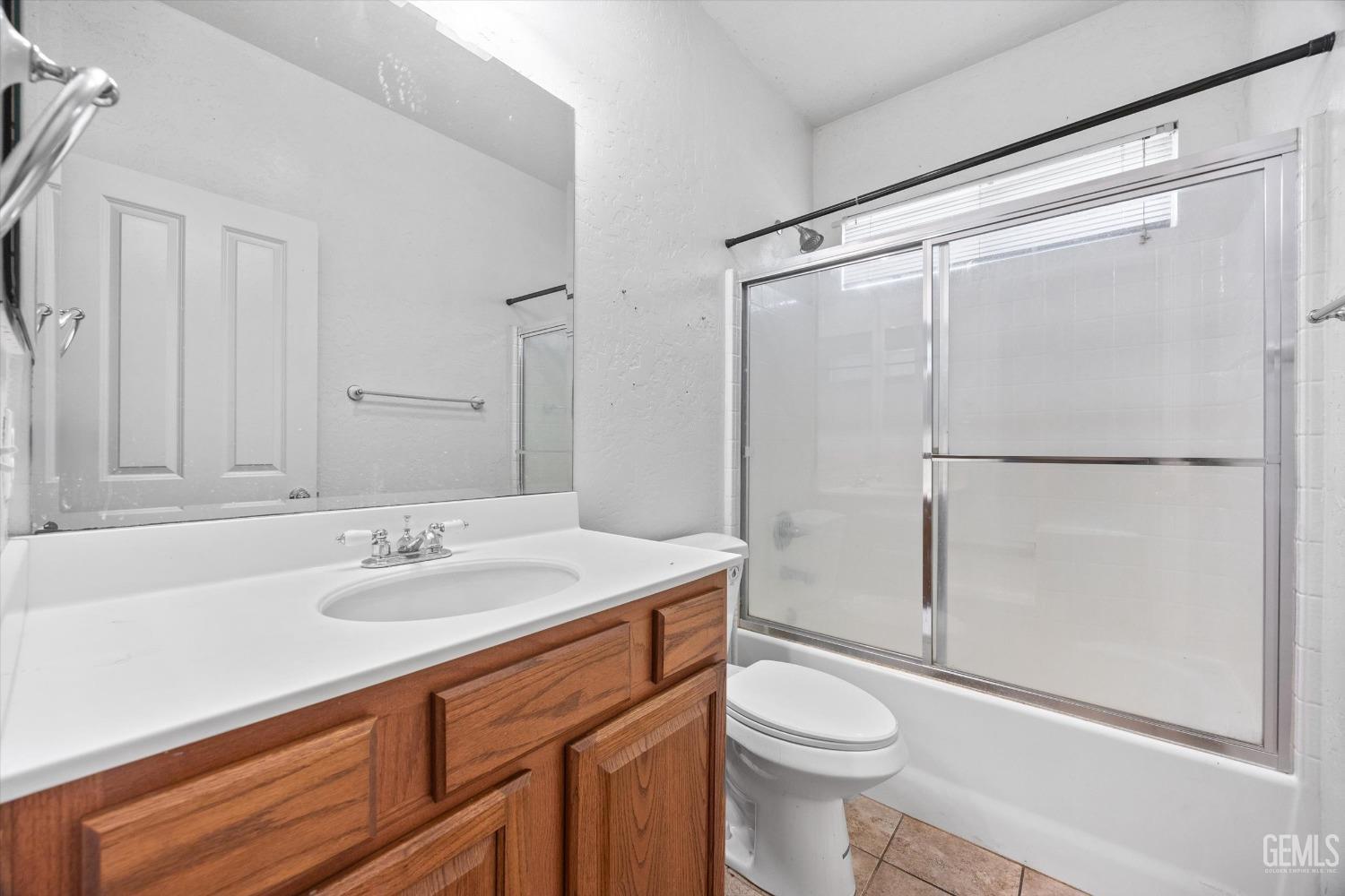 Undisclosed Address Bakersfield, CA 93313 - Photo 20 of 24 a bathroom with a sink toilet and shower
