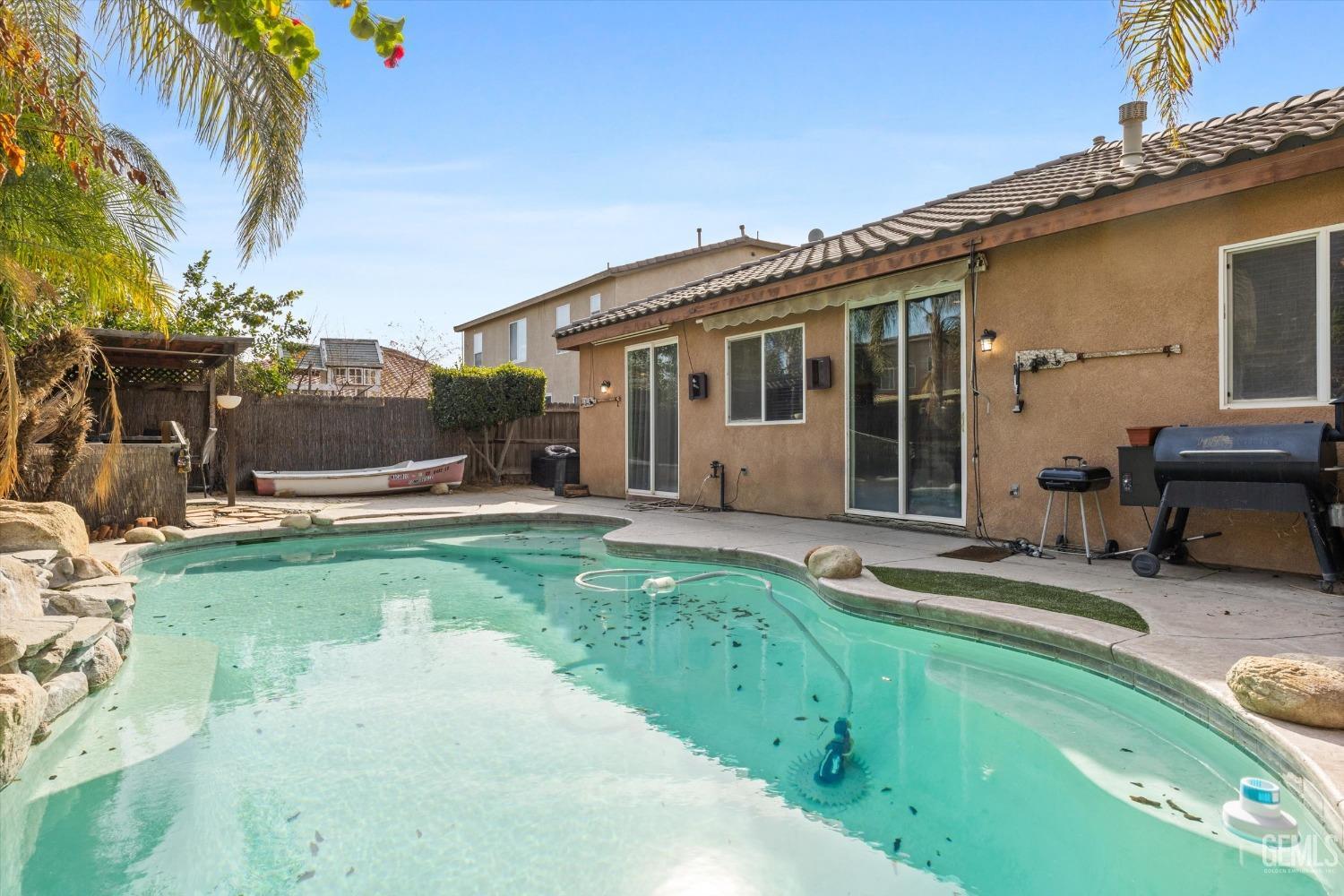 Undisclosed Address Bakersfield, CA 93313 - Photo 22 of 24 a front view of house with yard and outdoor seating