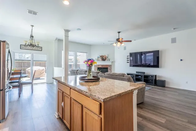 a view of a living room and dining room