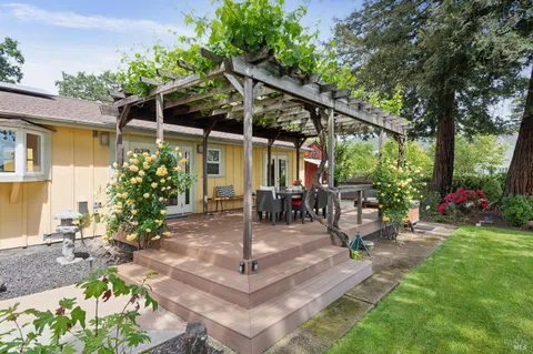 a backyard of a house with lots of green space