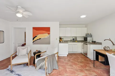 a kitchen with a sink cabinets and appliances