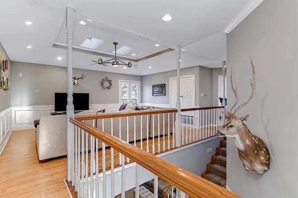 a view of entryway with wooden floor
