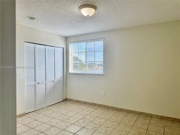 a bathroom with a sink a toilet and bathtub