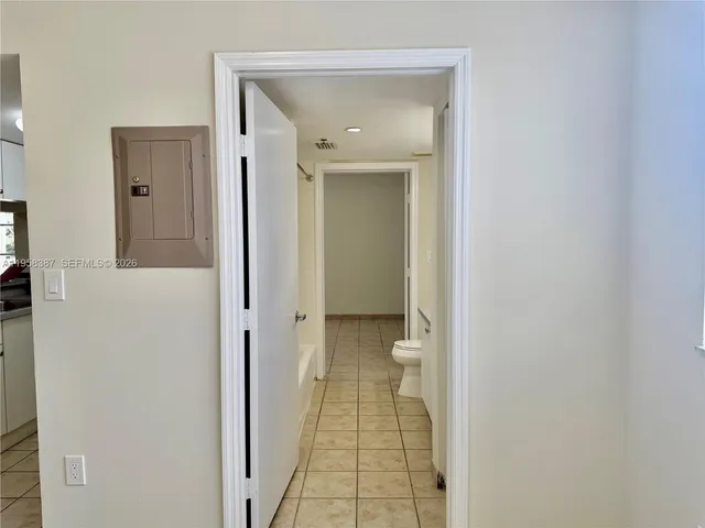 a view of an empty room and window