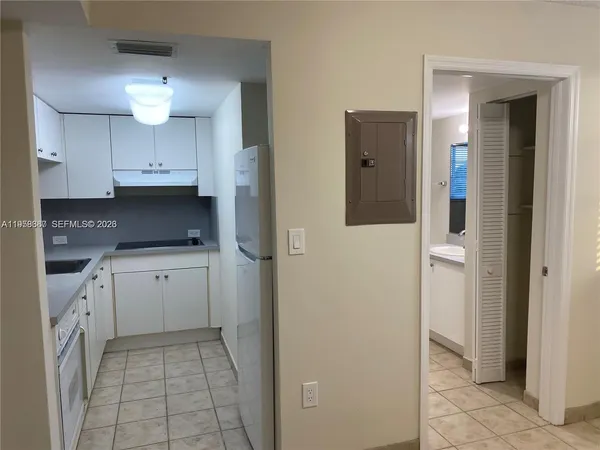 a view of a livingroom with wooden floor