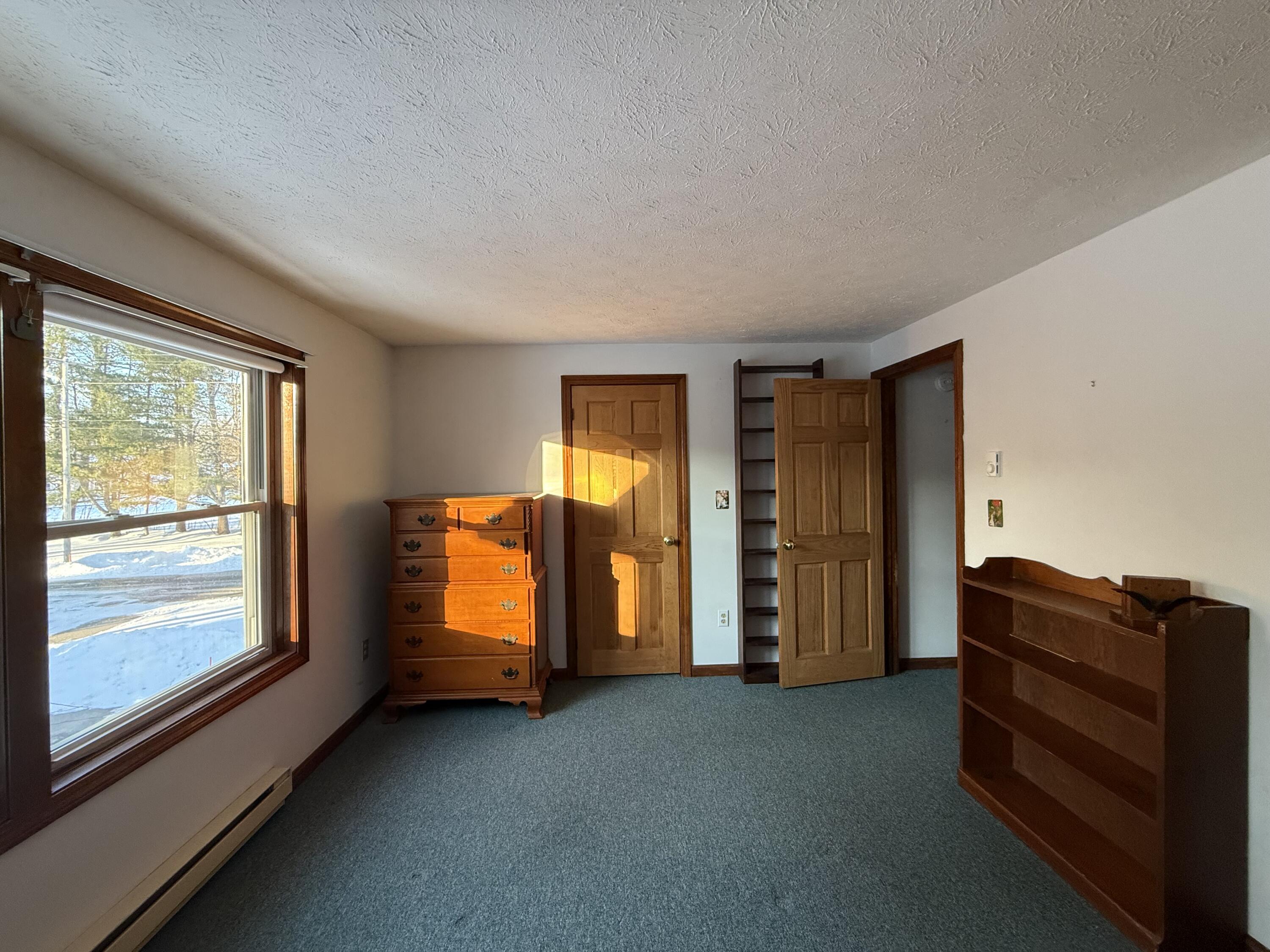 60 Brown Street, Unit 2 Kennebunk, ME 04043 - Photo 17 of 28 Bedroom with door to loft
