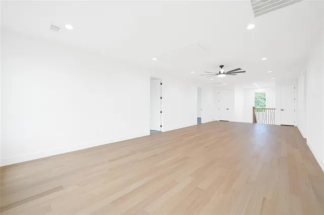 a living room with furniture kitchen view and a table
