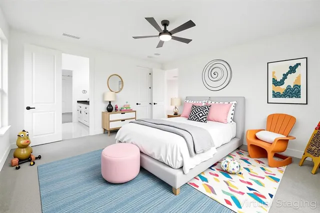 a view of empty room with ceiling fan