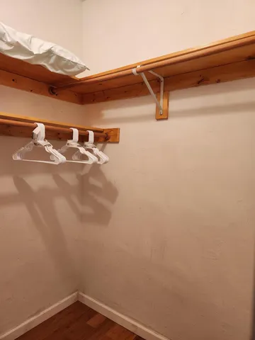 a view of storage and utility room with washer and dryer