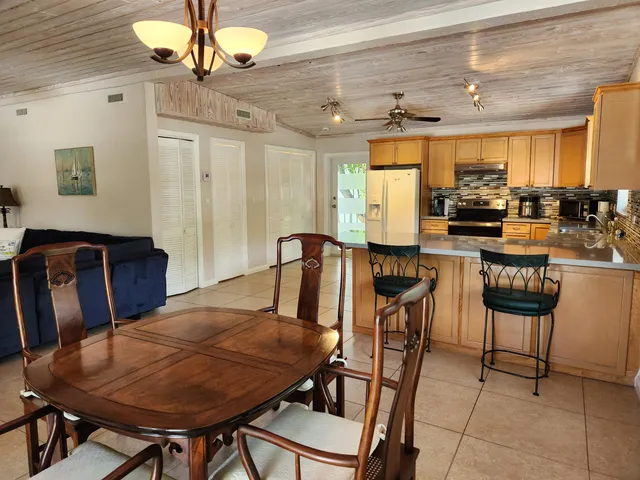 a view of a dining room with furniture