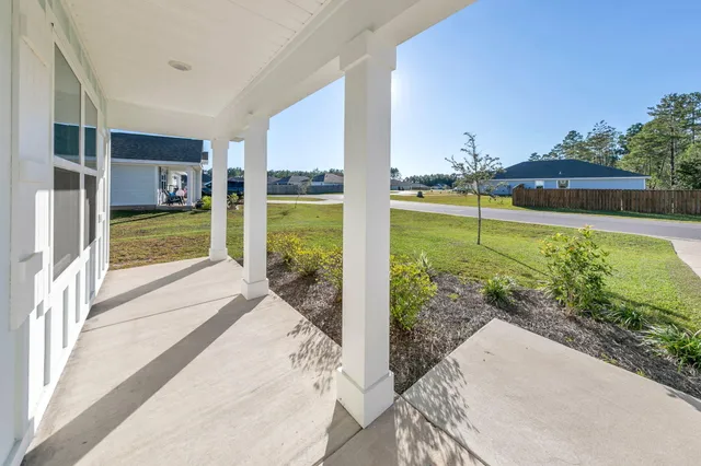 a view of swimming pool from a balcony