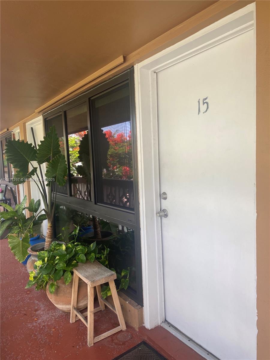 a room with a table and chairs