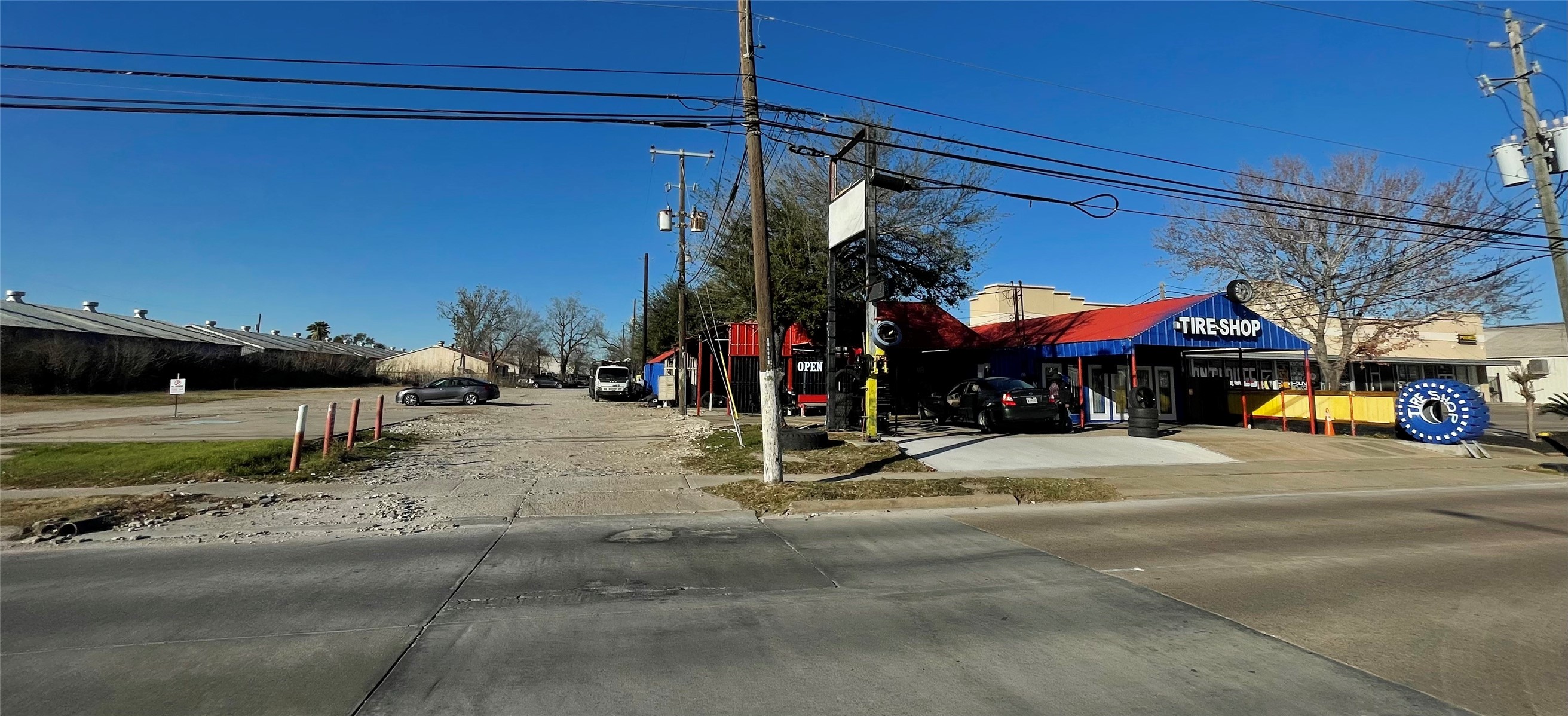 4920 West 34th Street Houston, TX 77092 - Photo 2 of 7 a view of street with small shops